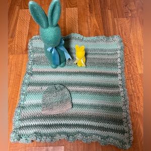 Handmade crocheted small baby blanket with matching beanie hat